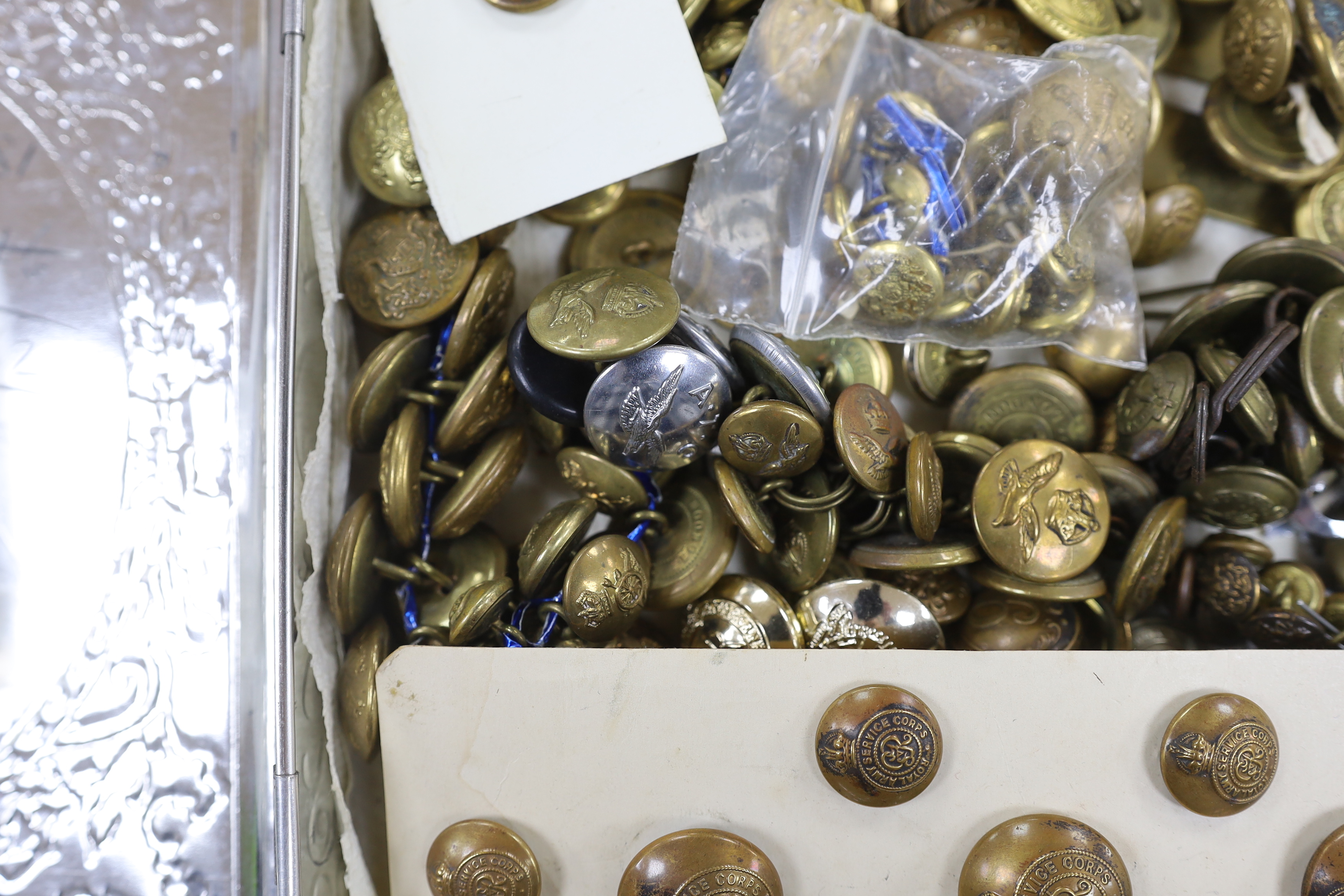 A collection of military buttons, examples including; Royal Fusiliers, Royal Navy, Royal Artillery, RASC, RAMC, RAF, etc. and a few cloth titles, etc.